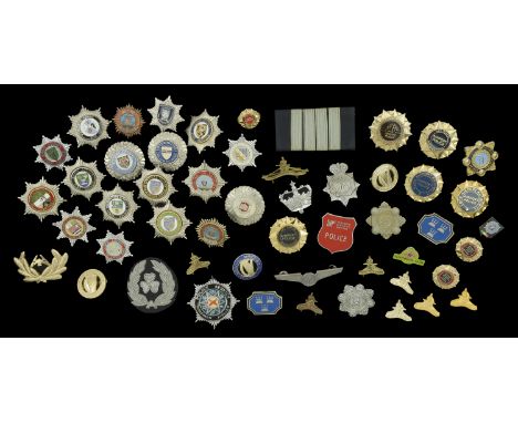 A Selection of Modern Irish Police and Fire Brigade Insignia. Including several Garda Siochana metal and cloth badges, and Fi