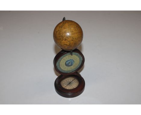 A Newton's New and Improved terrestrial globe on stand, the base fitted with a compass, 23cm high overall, Globe 3" Dia