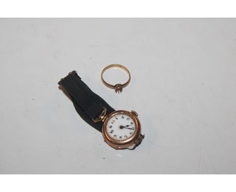 A 22ct gold ring AF, approx. 2.4gms and a 9ct gold cased wrist watch AF