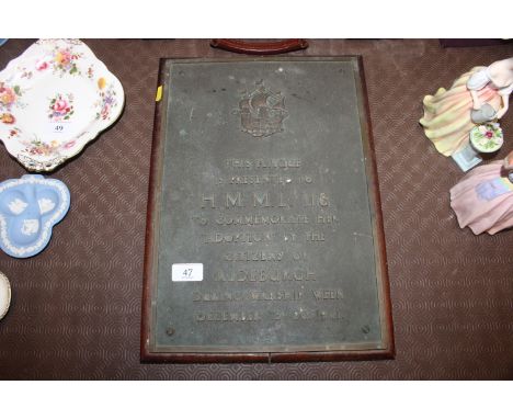 A mounted plaque "The Plaque is Presented to H. M. M. L118 to Commemorate her Adoption by the Citizens of Aldeburgh During Wa