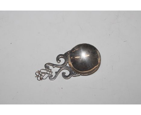 A Scottish silver caddy spoon with elongated S shaped and entwined double heart crown topped handle, hallmarked Edinburgh 198