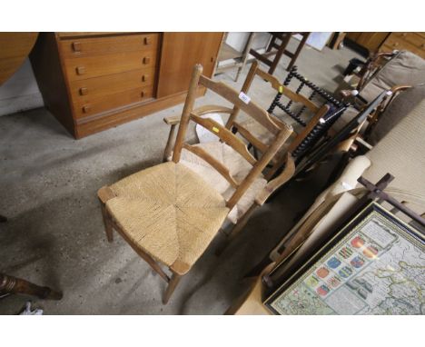 Two string seated and rush seated ladder back chairs 