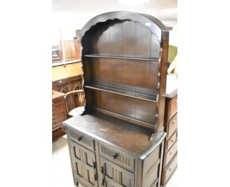 A vintage Priory style dark stained Dutch dresser, width approx. 92cm