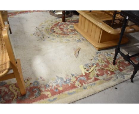 A vintage room sized carpet square having cream ground, approx 360 x 270cm