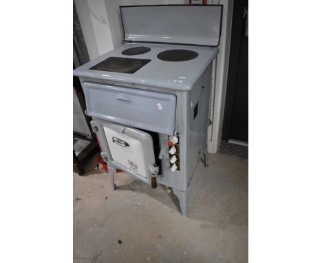 A vintage enamelled electric cooker, Revo R34-A , sold as decorative and untested collectable item