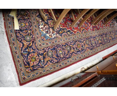 A vintage carpet square having red ground, approx. 295 x 200cm, light wear only
Hand loomed.