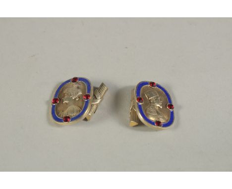 A PAIR OF RUSSIAN SILVER AND BLUE ENAMEL KING AND QUEEN CUFFLINKS. Mark Head 88.  LP.