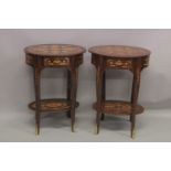 A PAIR OF LOUIS XVI DESIGN OVAL BEDSIDE TABLES. 2ft 5ins high x 1ft 9ins wide.