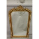A GOOD LARGE GILT FRAMED VICTORIAN STYLE PIER MIRROR with decorative cresting. 7ft 3ins x 4ft 2ins.