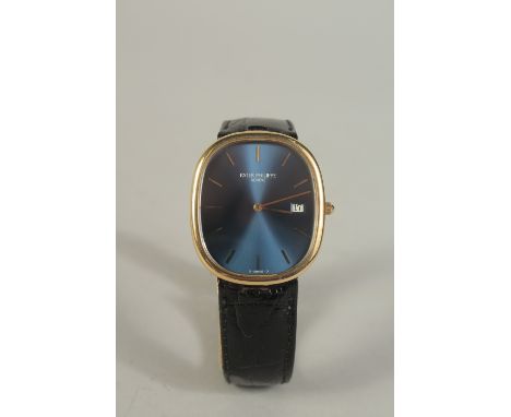 A PATEK PHILIPPE, MODEL 3747 18K YELLOW GOLD WRIST WATCH with sunburst cobalt blue dial and leather strap.  1990. Sold with c