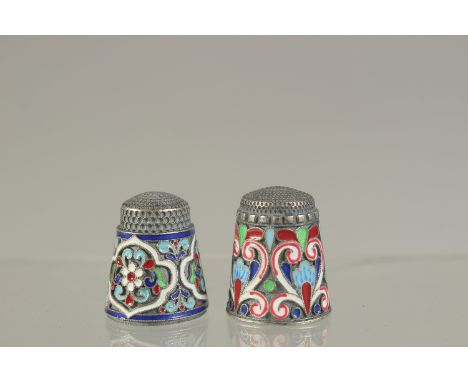 TWO RUSSIAN SILVER AND ENAMEL THIMBLES.