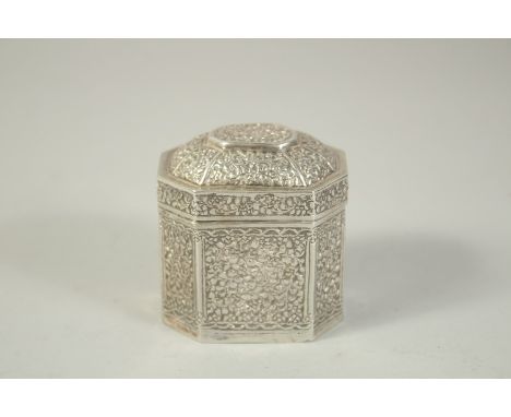A SMALL BURMESE SILVER TEA CADDY AND COVER. 3ins high.