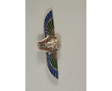 A SILVER AND ENAMEL PHARAOH BROOCH.