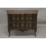 A GOOD 19TH CENTURY ITALIAN TWO DRAWER COMMODE of serpentine outline, heavy brass handles and