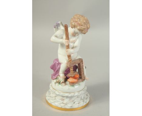 A MEISSEN FIGURE OF CUPID pressing two hearts together, modelled by Heinrich Schwabe from a series of 26 figures.  Circa. 190