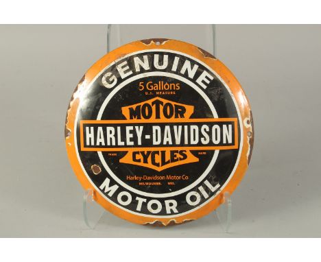 A CIRCULAR ENAMEL SIGN "HARLEY DAVIDSON". 12ins diameter.