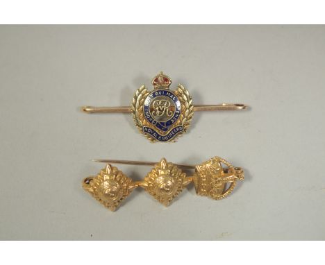 A ROYAL ENGINEERS GOLD AND BLUE ENAMEL BROOCH AND ANOTHER, THREE PIPS. (2).