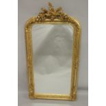 A GOOD GILTWOOD MIRROR with birds and flowers. 5ft high x 2ft 7ins wide.