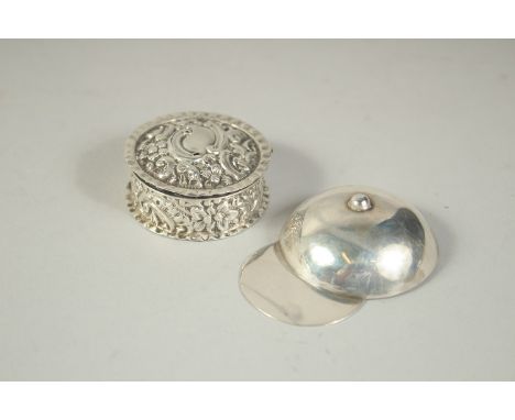 AN IRISH SILVER JOCKEY CAP CADDY SPOON. Dublin 1849 and a small circular box. (2).