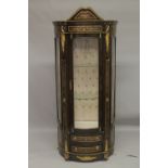 A LOUIS XVI DESIGN INLAID BOWFRONTED VITRINE with two glass shelves. 6ft 3ins high x 2ft 7ins wide.