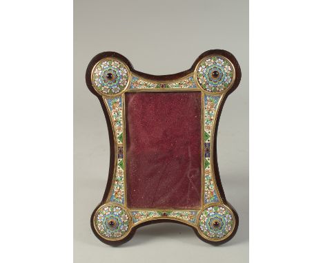 A GOOD RUSSIAN SILVER AND ENAMEL SHAPED PHOTOGRAPH FRAME. 24cms x 18cms.