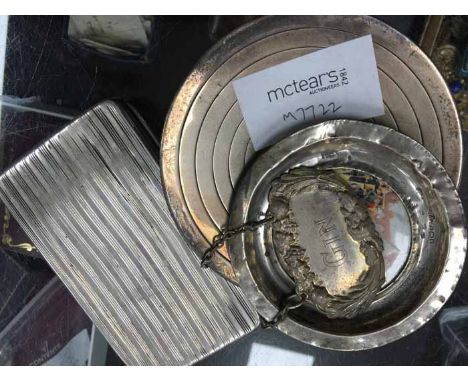 LOT OF SILVER ITEMS
including a Continental cigar case, a small silver tazza decorated with concentric circles, a silver moun