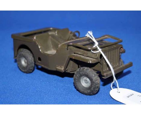 TWO TRIANG MINIC MINIATURE CLOCKWORK SCALE MODELS
comprising of a boxed Saloon car and an unboxed military vehicle (2)