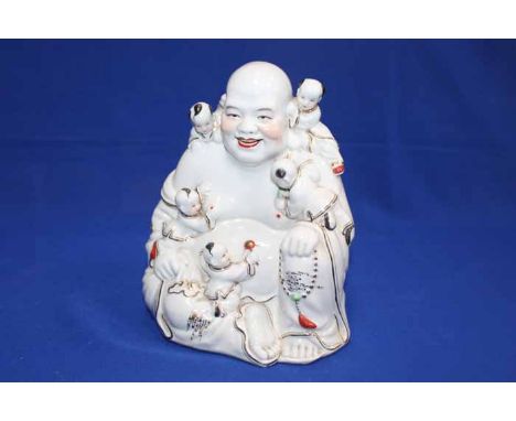 CERAMIC FIGURE OF BUDDHA