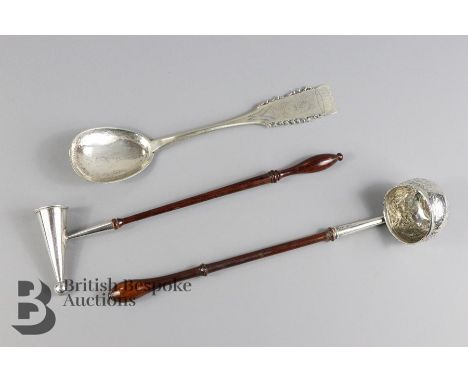 Swedish silver spoon, dated 1927, the handle engraved with a figure and bowl engraved with a reindeer and sled, approx 25 cms