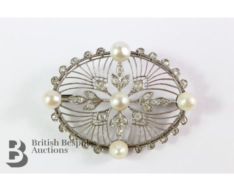 Belle Epoque platinum diamond and pearl brooch, approx set with approx 80 pts of dias and five pearls approx 6 mm, in a clare