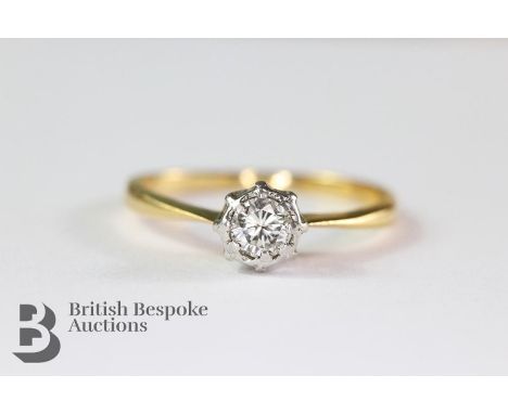 An 18ct yellow gold (tested) diamond solitaire ring, size O, approx 2.4 gms. The ring set with approx 16 pts dias.&nbsp;