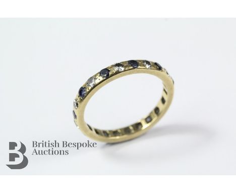 18ct yellow gold sapphire and diamond eternity ring, size N, approx 2.58 gms, 11 x 5 pts of diamonds and 11 x 2.5mm sapphires