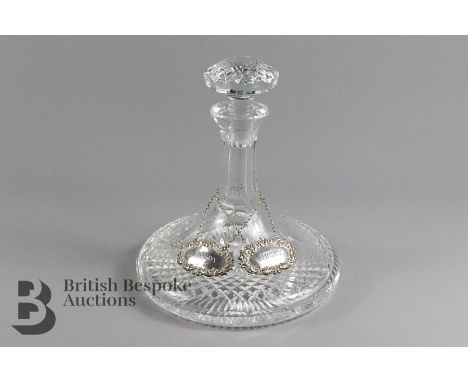 Cut glass ships decanter, with two silver whiskey and brandy decanters, one is London hallmark dated 1985 mm D88, approx 25 g