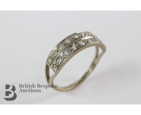 18ct white gold double eternity ring. The ring set with approx 45 pts of eight-cut dias, size Q+, approx 3.8 gms.&nbsp;