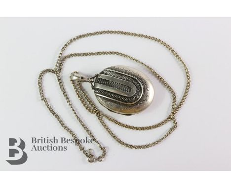Victorian silver oval locket and chain, Birmingham hallmark, dated 1882, mm E &amp; B, approx 27.3 gms.