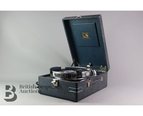 Early His Masters Voice Portable Record Player, circa 1930, navy case and interior, chromium plated fittings, with a disc car