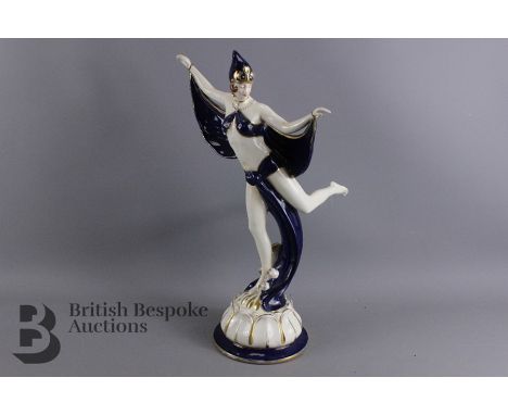 A Royal Dux porcelain figurine of a semi-nude 1920's dancer, approx 41 cms h, pink triangular mark to the base. Note; The dan