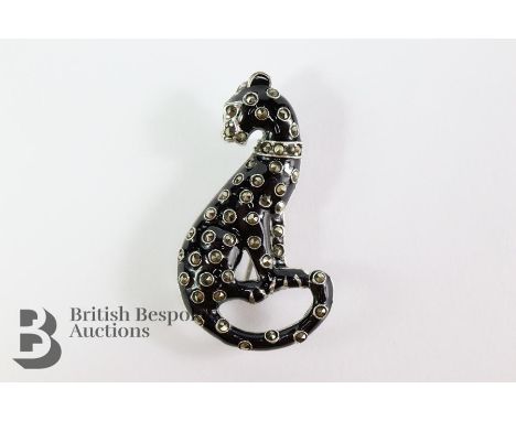Silver and enamel panther brooch, stamped 925, with coloured marcasite, approx 50 mm.&nbsp;