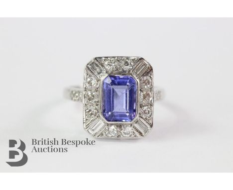 18ct white gold and Tanzanite ring, size K, the centre stone approx 8 x 6 mm, surrounded by approx 32 pts of dias, approx 3.5