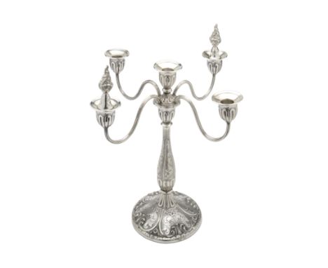 A SILVER CANDELABRUM, PROBABLY MEXICAN, 1940s the circular stick with baluster stem, chased overall with scroll foliate matte