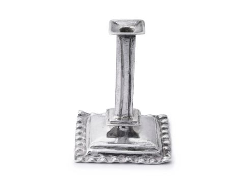 A DUTCH SILVER MINIATURE CANDLESTICK, PROBABLY 19TH CENTURY on square base with crImped borders, with fluted column stem, 3.5