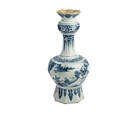 A DUTCH DELFT BLUE AND WHITE GARLIC-NECK VASE, CIRCA 1700 octagonally faceted, the bulbous body painted in Chinese Transition