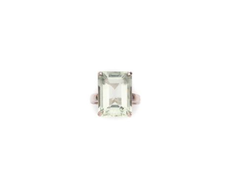 TIFFANY &amp; CO: GREEN QUARTZ RING claw set with a rectangular step-cut green quartz, mounted in silver, signed Tiffany &amp