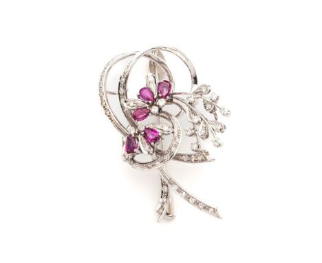RUBY AND DIAMOND BROOCH of ribbon tied floral design, set with brilliant- and single-cut diamonds, accented with pear-shaped 