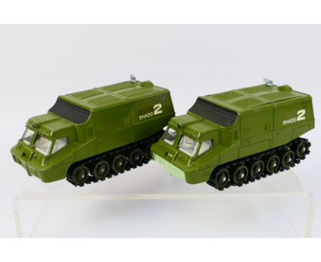 Dinky - 2 x unboxed Shado 2 vehicles from the UFO TV series, one with dark green body, base and orange underside of roof, the