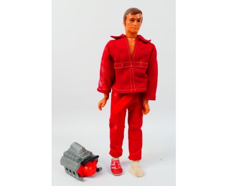 Kenner - An unboxed Six Million Dollar Man figure with engine, the figure appears in Good condition, the outfit is worn and o