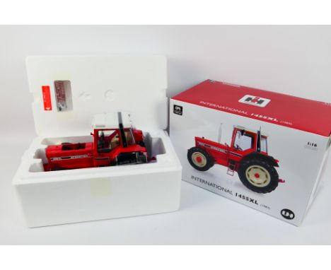 Universal Hobbies - A boxed limited edition 1983 International 1455XL tractor in 1:16 scale # UH4000. The model is one of onl