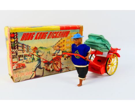 PMC - A boxed #36 Hong Kong Ricksaw model - The plastic model is made in Hong Kong. Appears in good condition. Lift off lid b