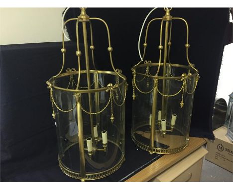 Pair of lantern style chandelier light fittings approximately 80cms tall