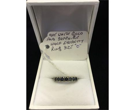 9ct white gold and sapphire half eternity ring size "O"